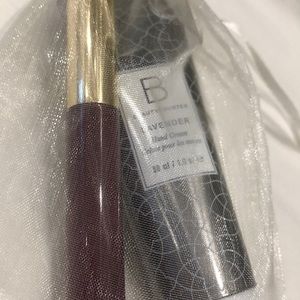 Brand new mini lip gloss/hand cream with gift bag!